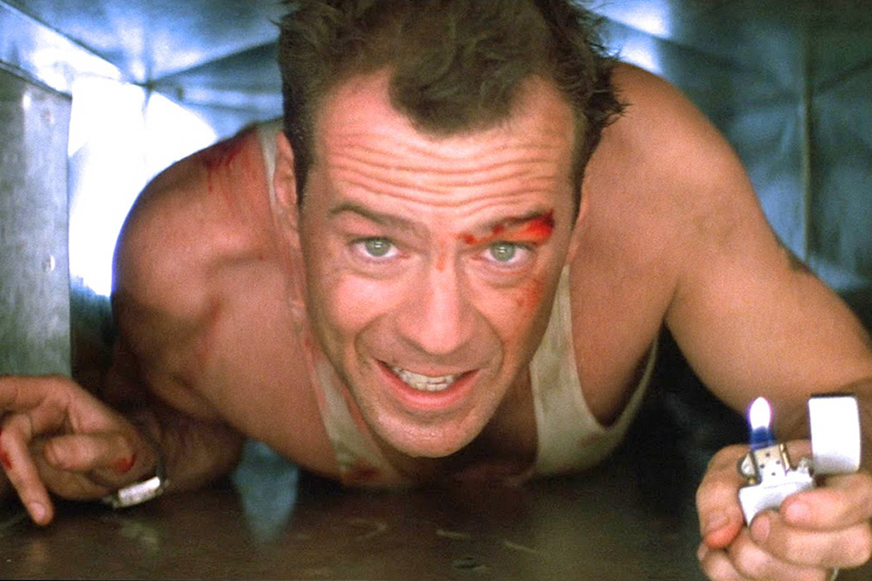 Bruce Willis in DIE HARD (1998). © 20th Century Fox